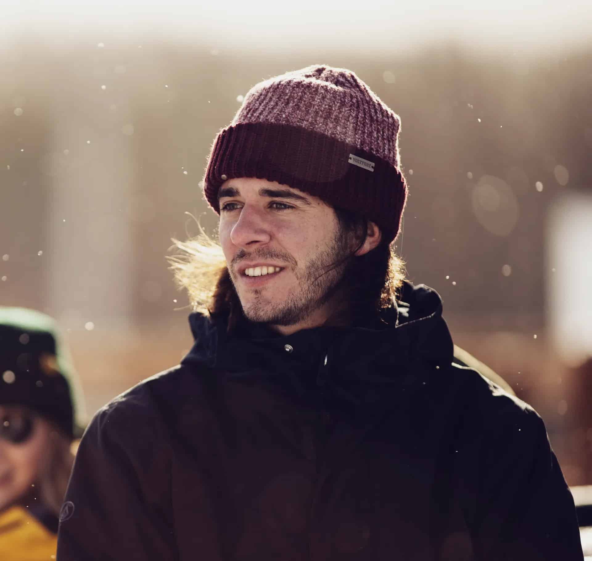Alex Henniffent, founder of VOLTFUSE, wearing a VOLTFUSE beanie