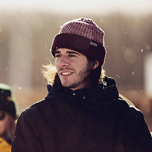 Alex Henniffent, founder of VOLTFUSE, wearing a VOLTFUSE beanie