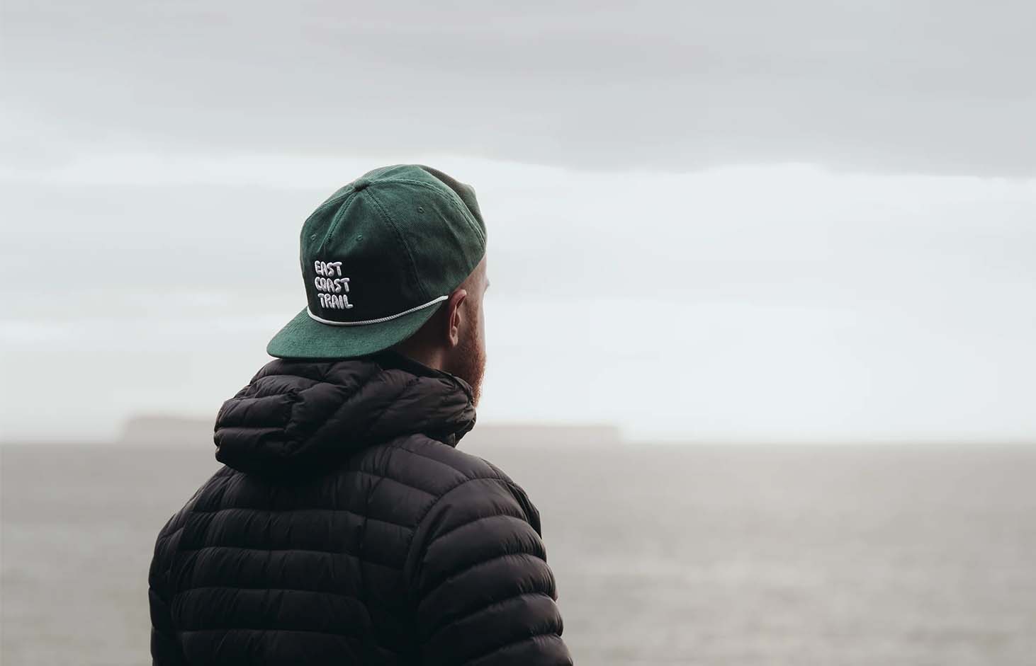 East Coast Trail cap worn overlooking the coast