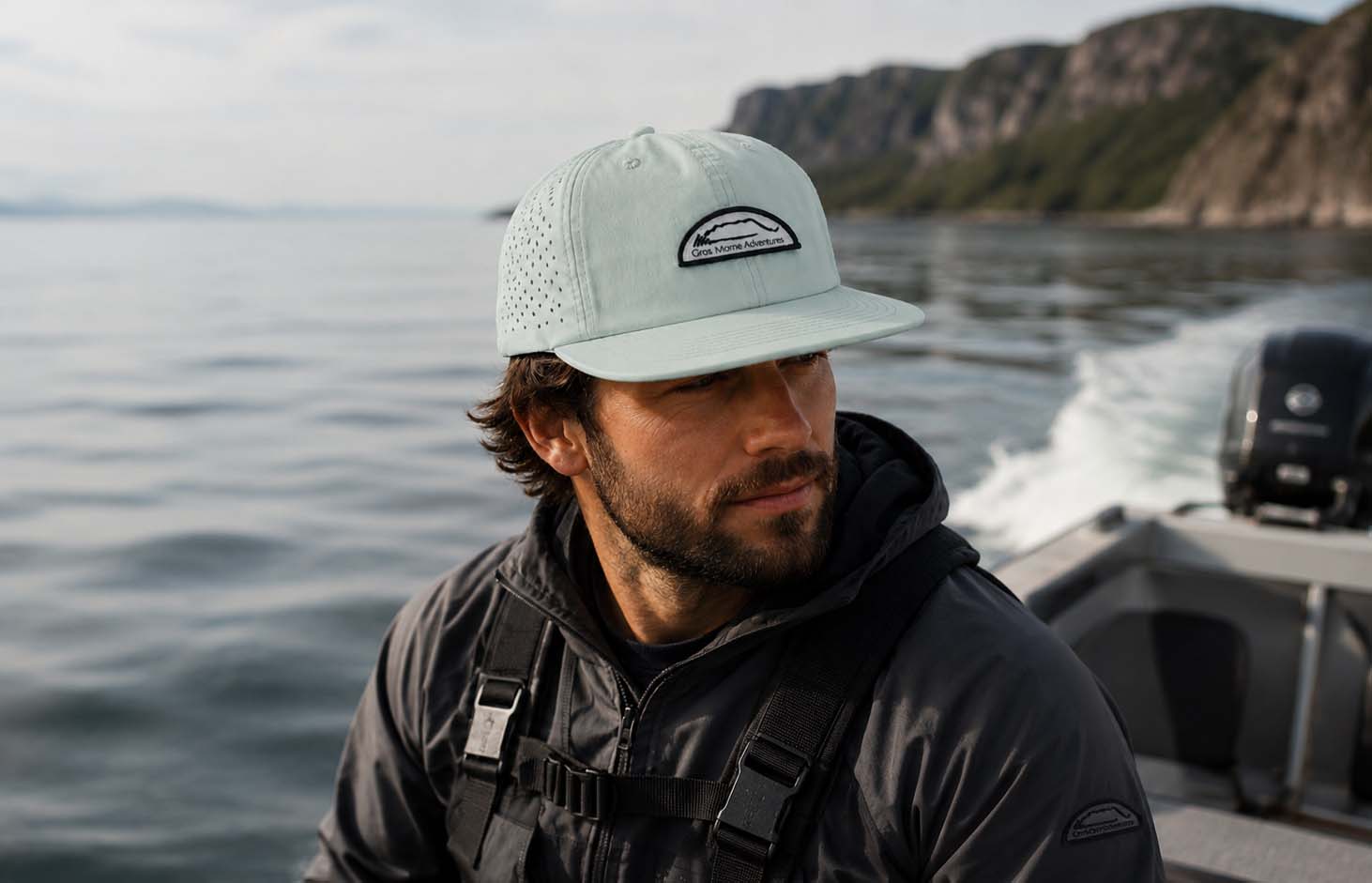Gros Morne Adventures cap worn on the water