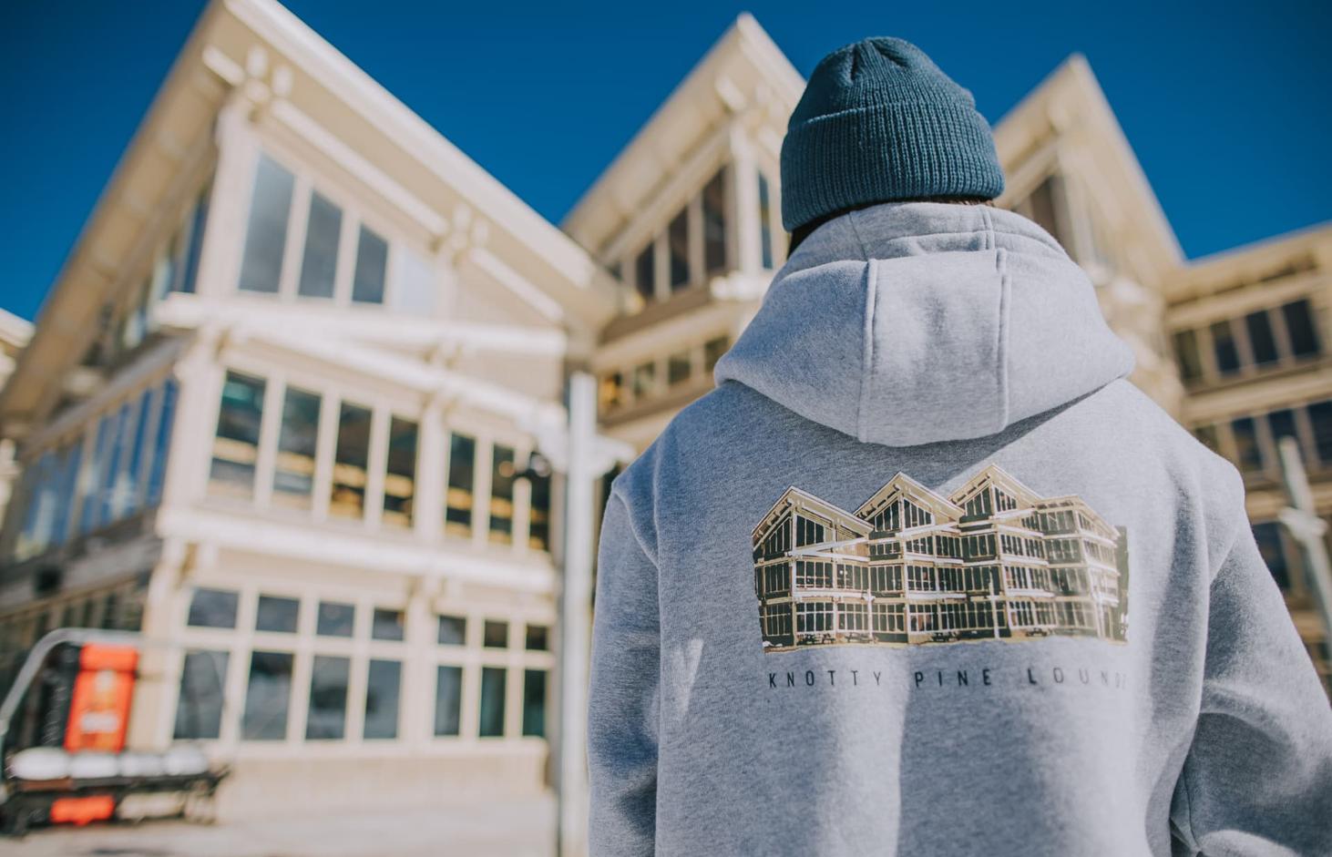 Marble Mountain beanie worn outside the resort lodge